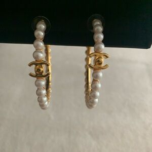 Chanel pearl hoops.